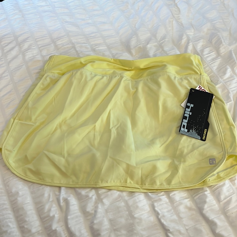 Hind yellow golf skirt with built in shorts.
